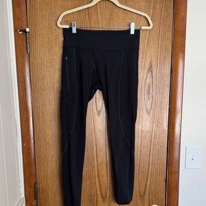 Black High-Waisted Leggings with reflective specks and zipper pocket